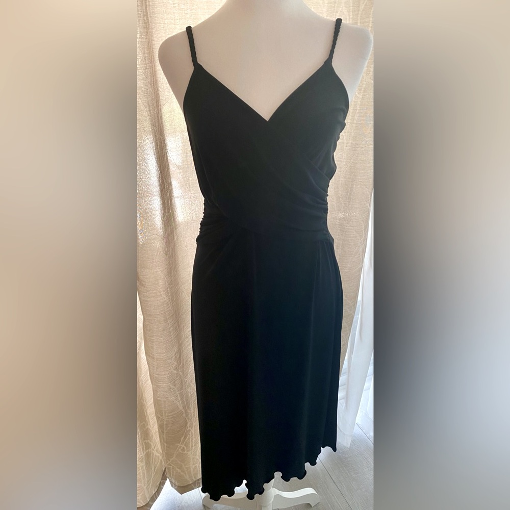 ALAGO’s spaghetti strap, A-line cocktail black dress for a party or evening out.